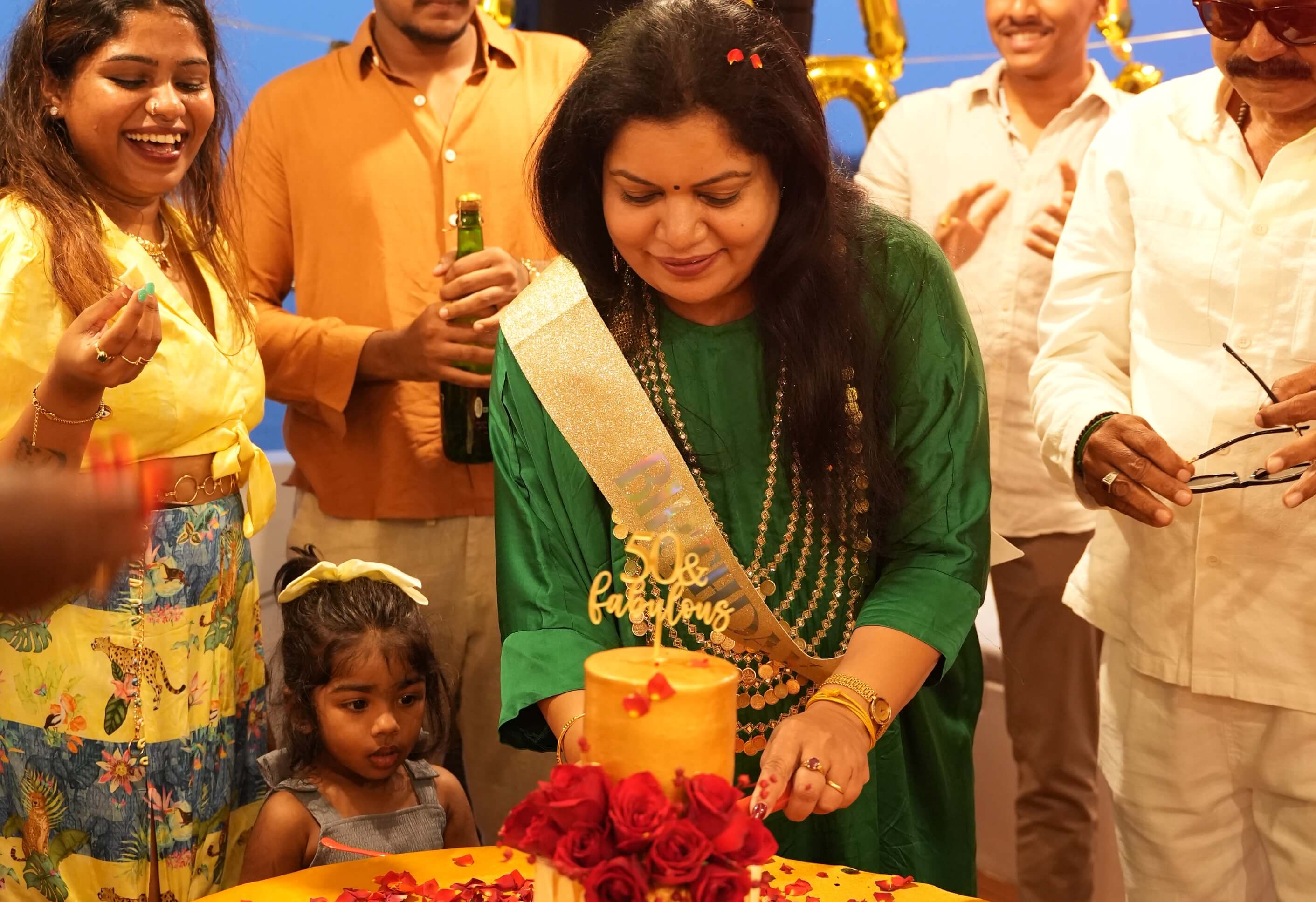 Cutting a birthday cake on a yacht in Goa