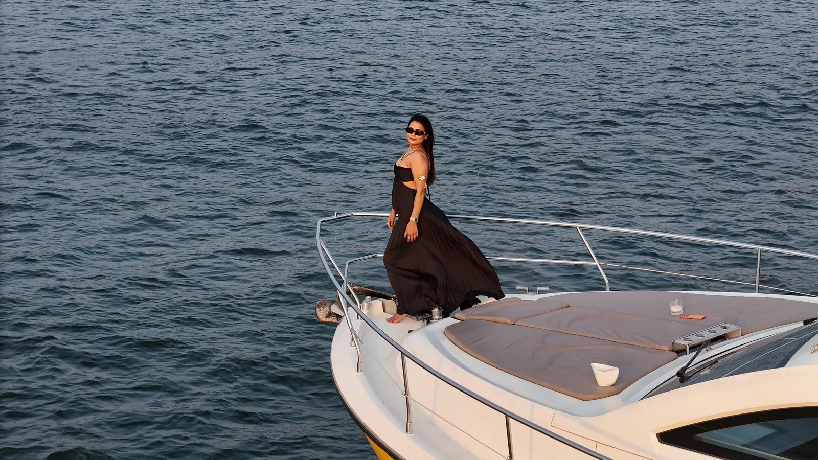 Golden hour aboard the Ciao Bella yacht near Miramar, Goa