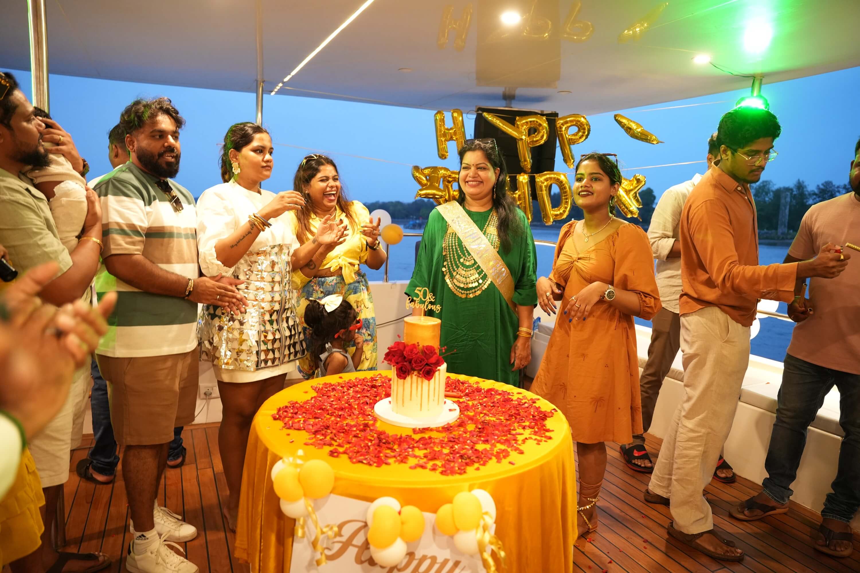 Birthday party on a catamaran deck in Goa at blue hour
